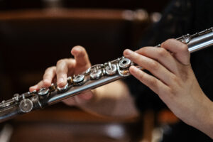 Shot of woman plaing flute